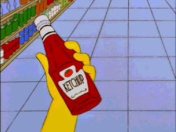 Choosing between two bottles labelled 'catsup' and 'ketchup'